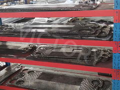 In che modo gli scambiatori di calore a piattaforma gestiscono gli ambienti ad alta pressione e ad alta temperatura?